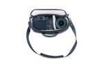 Cámara y objetivo en el bolso de foto negro Vanguard Veo GO 24M BK