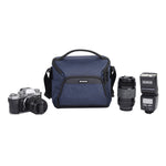 Vesta Aspire 21NV - Bolsa con correa para hombro color azul capacidad para cámara digital DSLR con un objetivo mediano incorporado, 1 ó 2 objetivos adicionales, un flash y accesorios